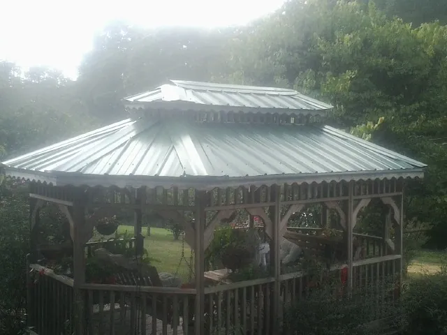 Two tier green metal roof on a garden gazebo in Blackwood